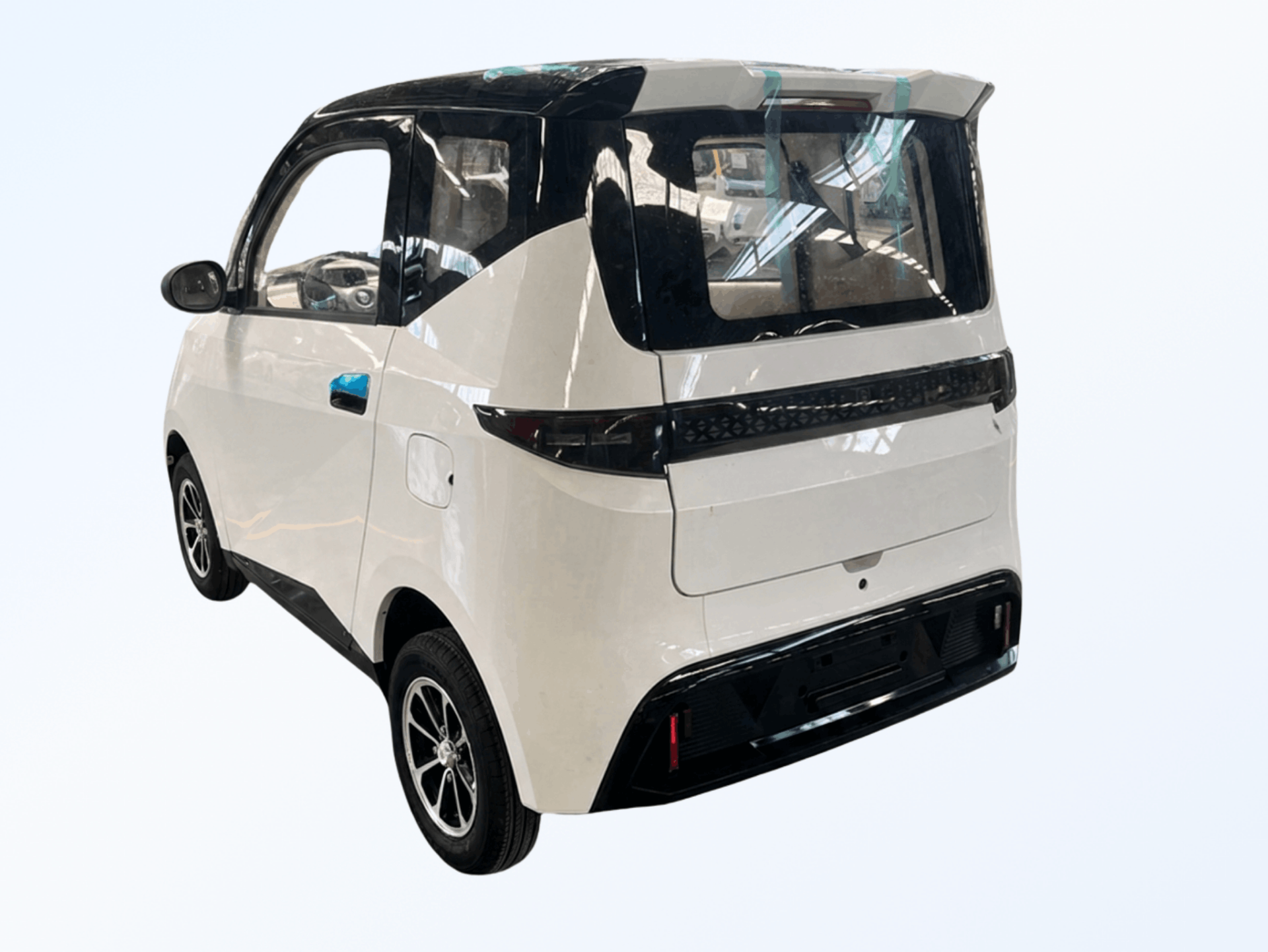 Kleinmobil Microcar City – Heckansicht schräg von links